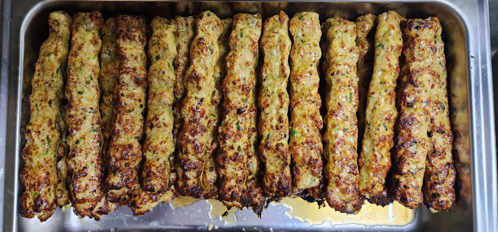 Trays of fresh kebabs, made the way it started